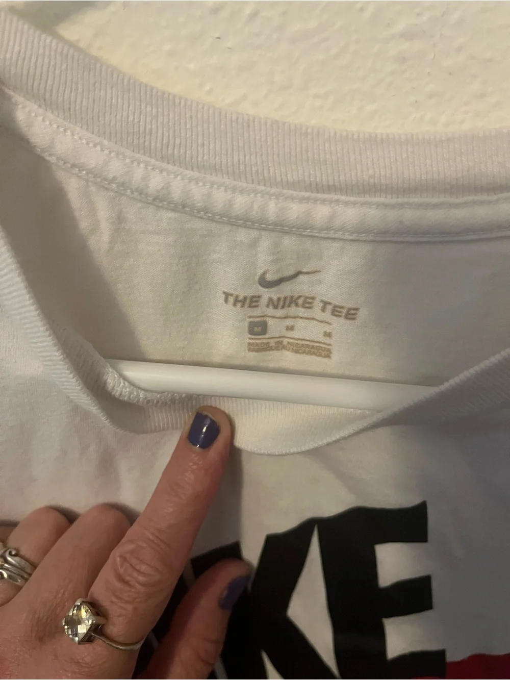 Nike White Short-Sleeve Tee with Red Swoosh and Black Logo